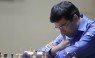 Anand held by Caruana; slips to joint third