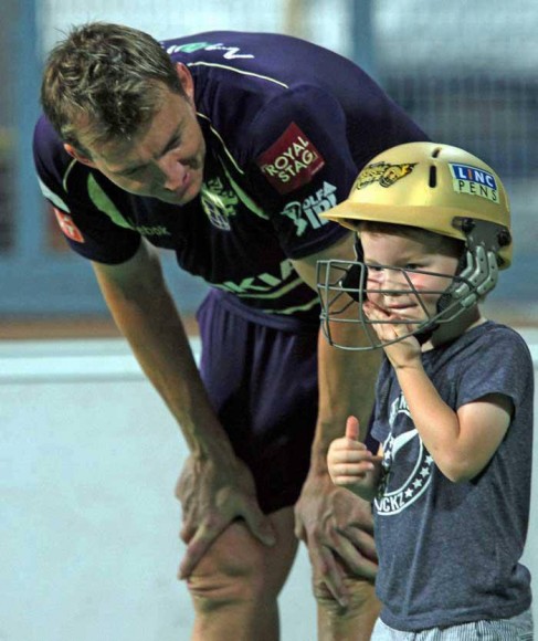 Brett Lee with his son