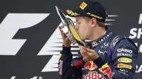 Vettel kisses his way to 197 points to lead the table